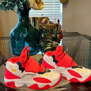 Boys size 13c pink and white in color Nikes